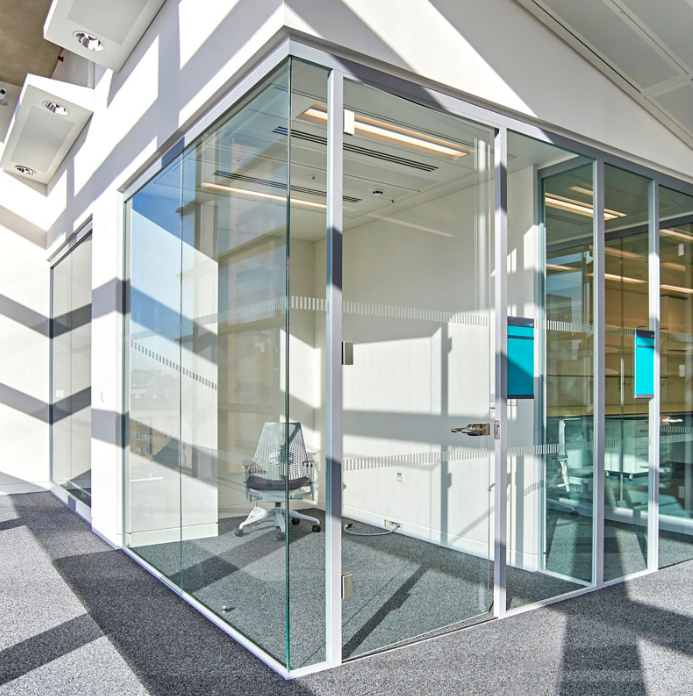 A healthcare interior design with glass partition walls