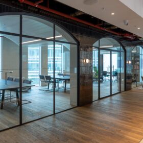 Project: Multinational Music Company | Products: Optima 117 Plus Shoreditch Edition glass partitions with Edge Symmetry double door set
