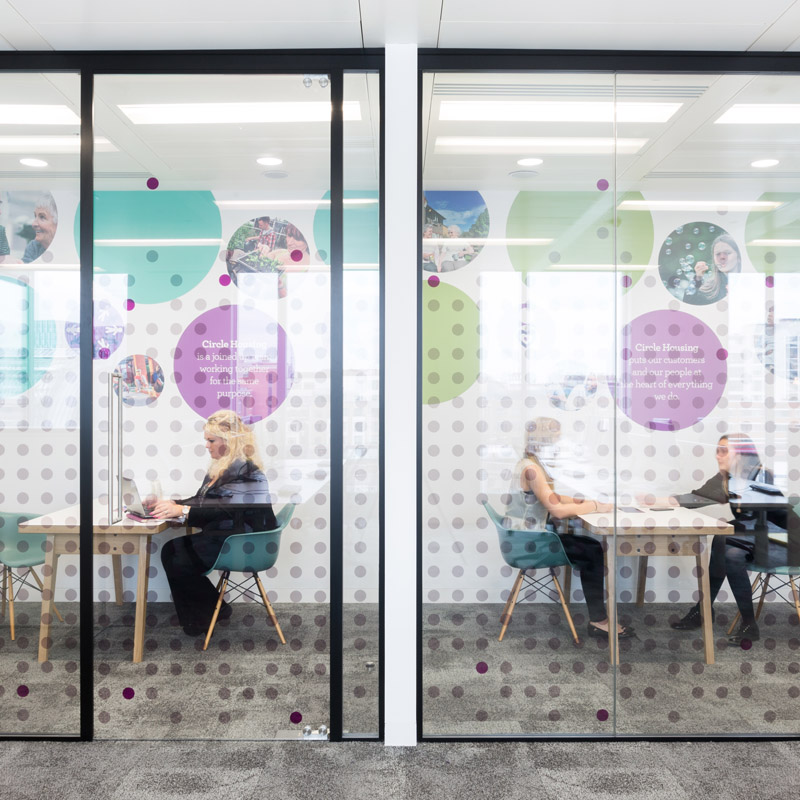 a playful and profession office glass door design