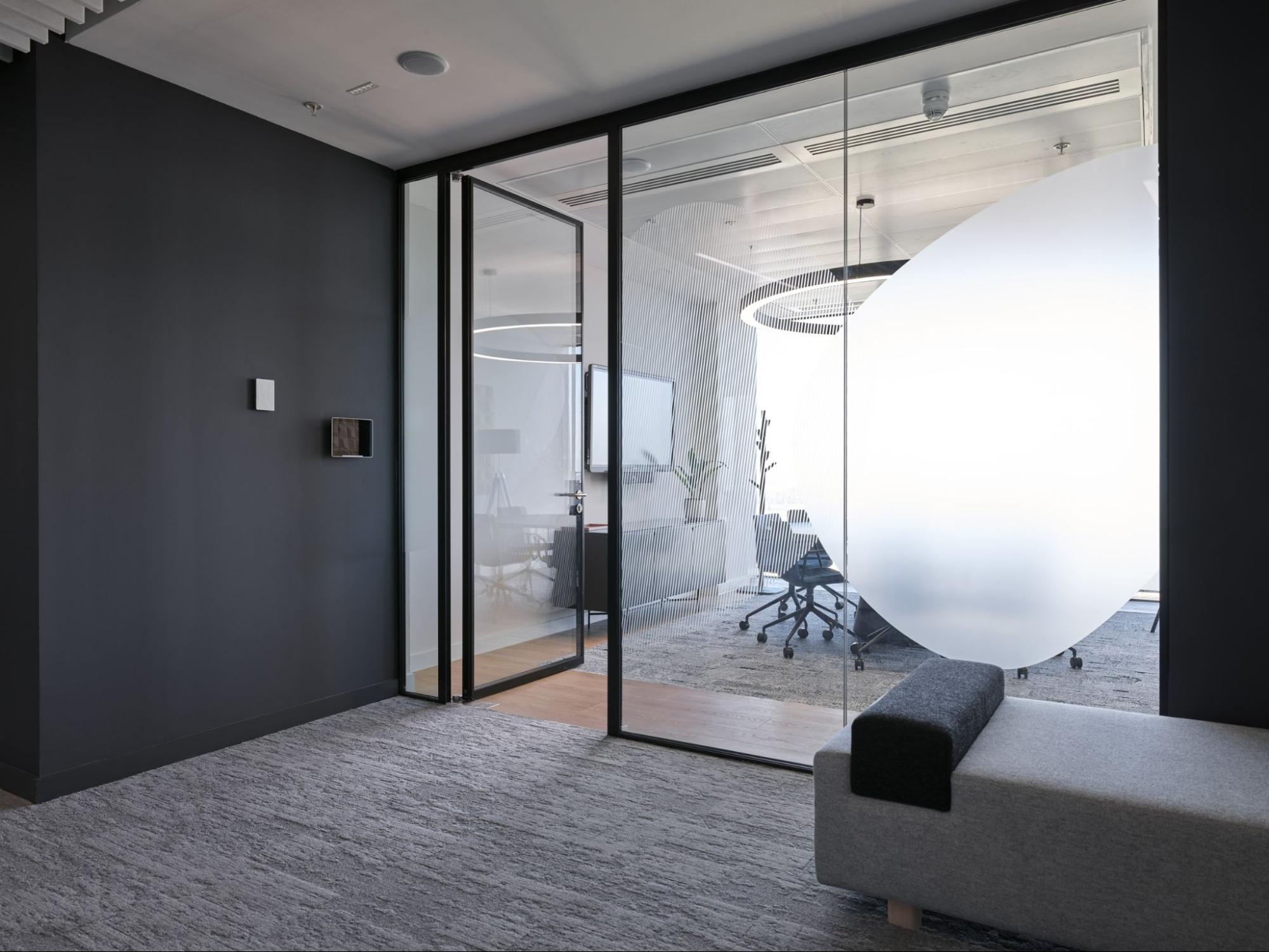 an office glass door design that contrasts colors