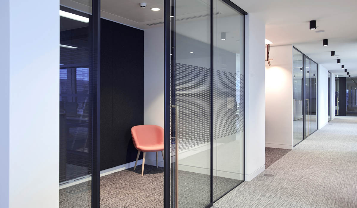 an image of an office rom with a sliding glass door