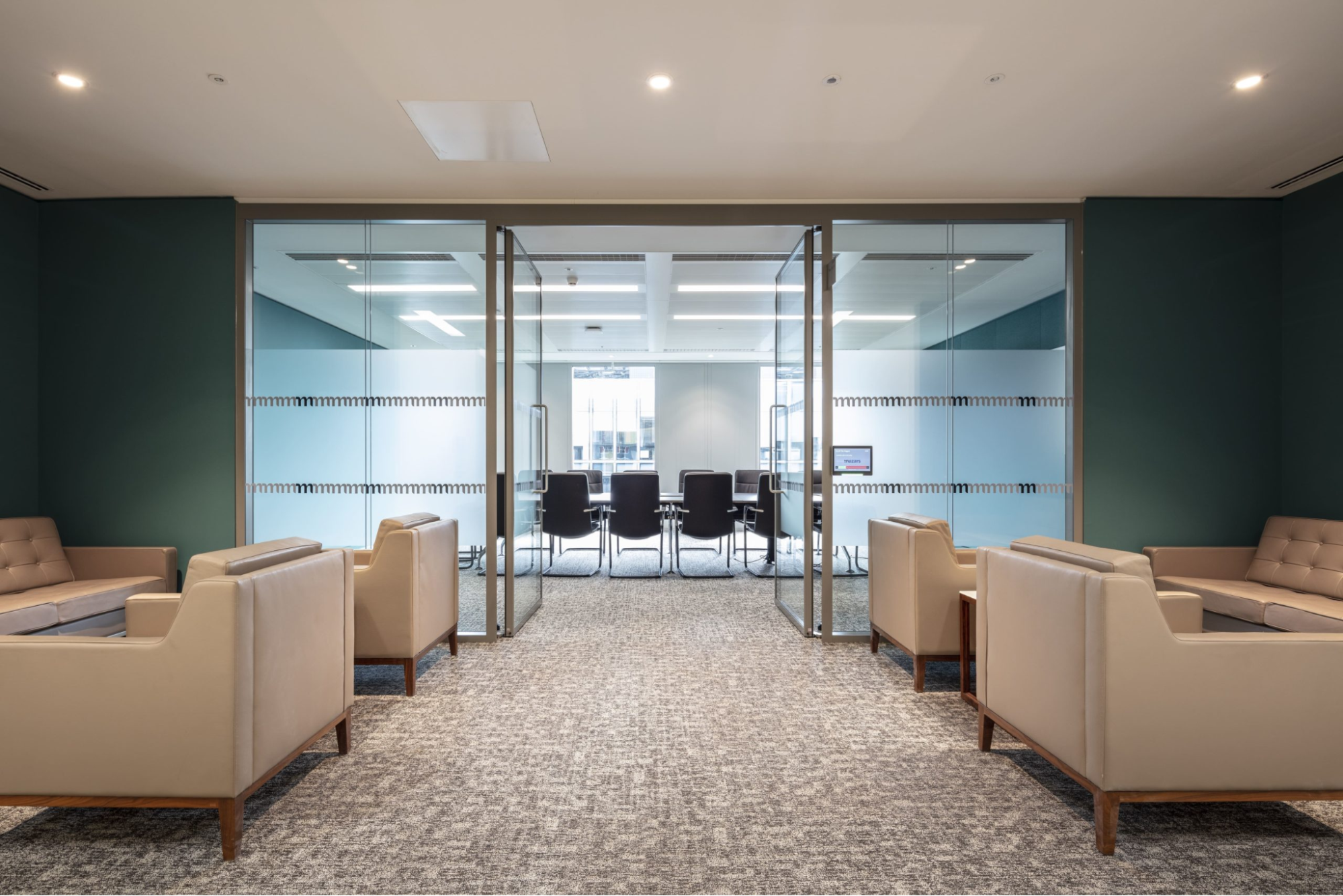 an image of an industrial glass wall divider in an office design