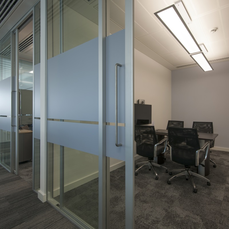 a close up image of an office door with white detailing