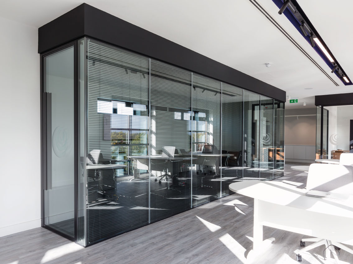 an image of office glass door designs with privacy glass